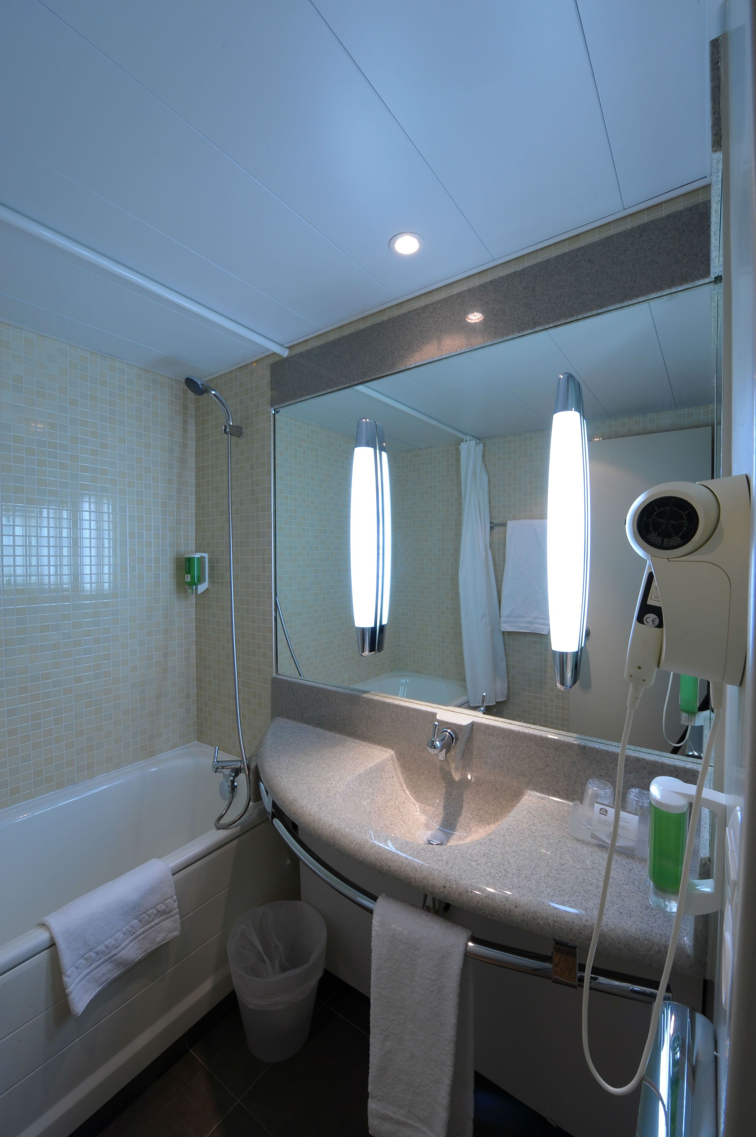 combined shower/bathtub, free toiletries, hair dryer, towels