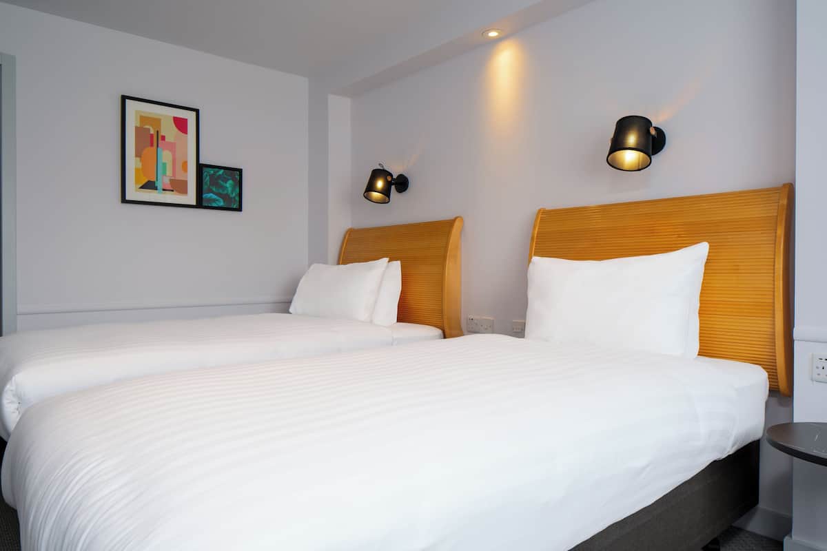 Standard Room, 2 Twin Beds | Desk, laptop workspace, blackout drapes, iron/ironing board