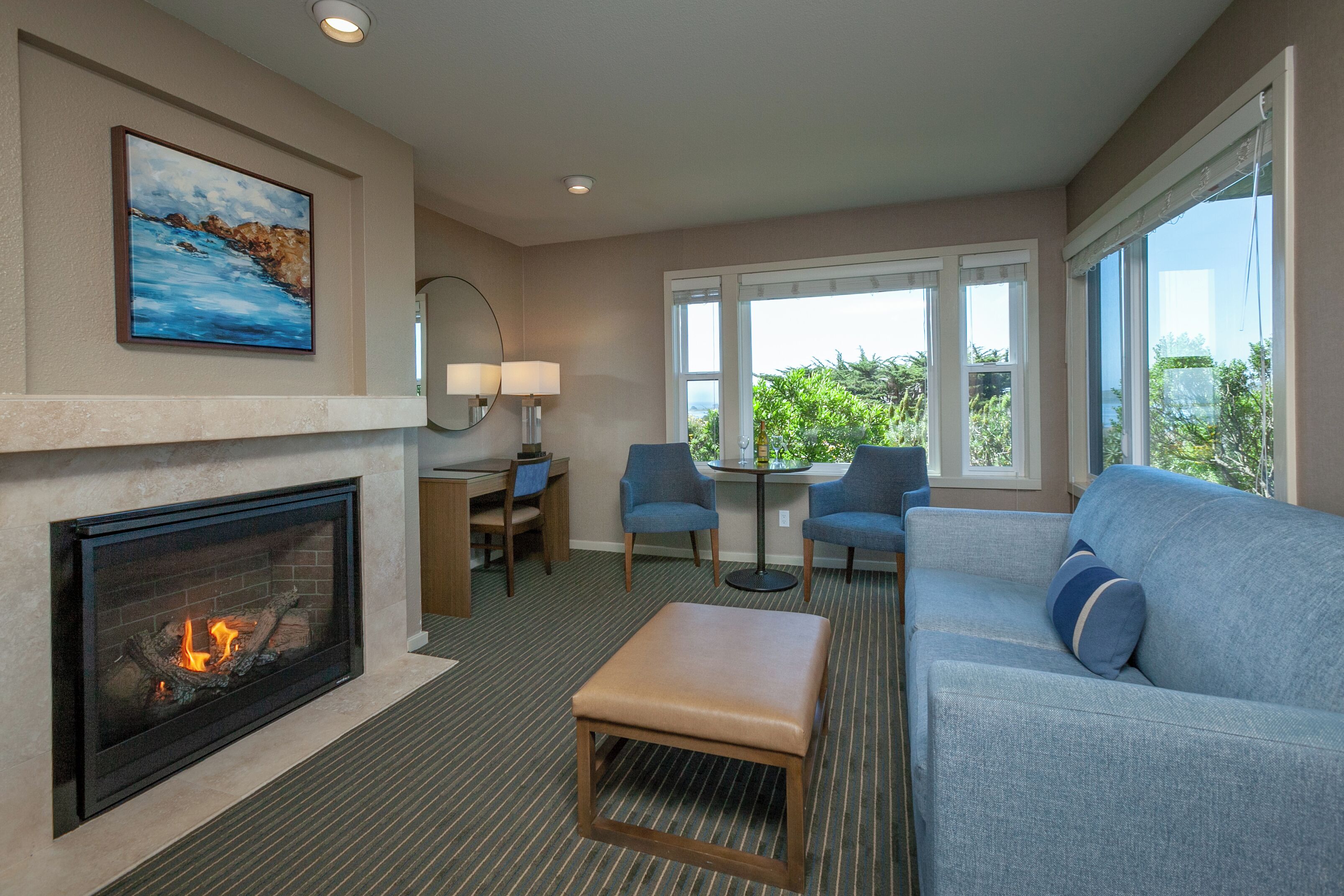 deluxe room, 1 king bed with sofa bed, fireplace, ground floor | living area