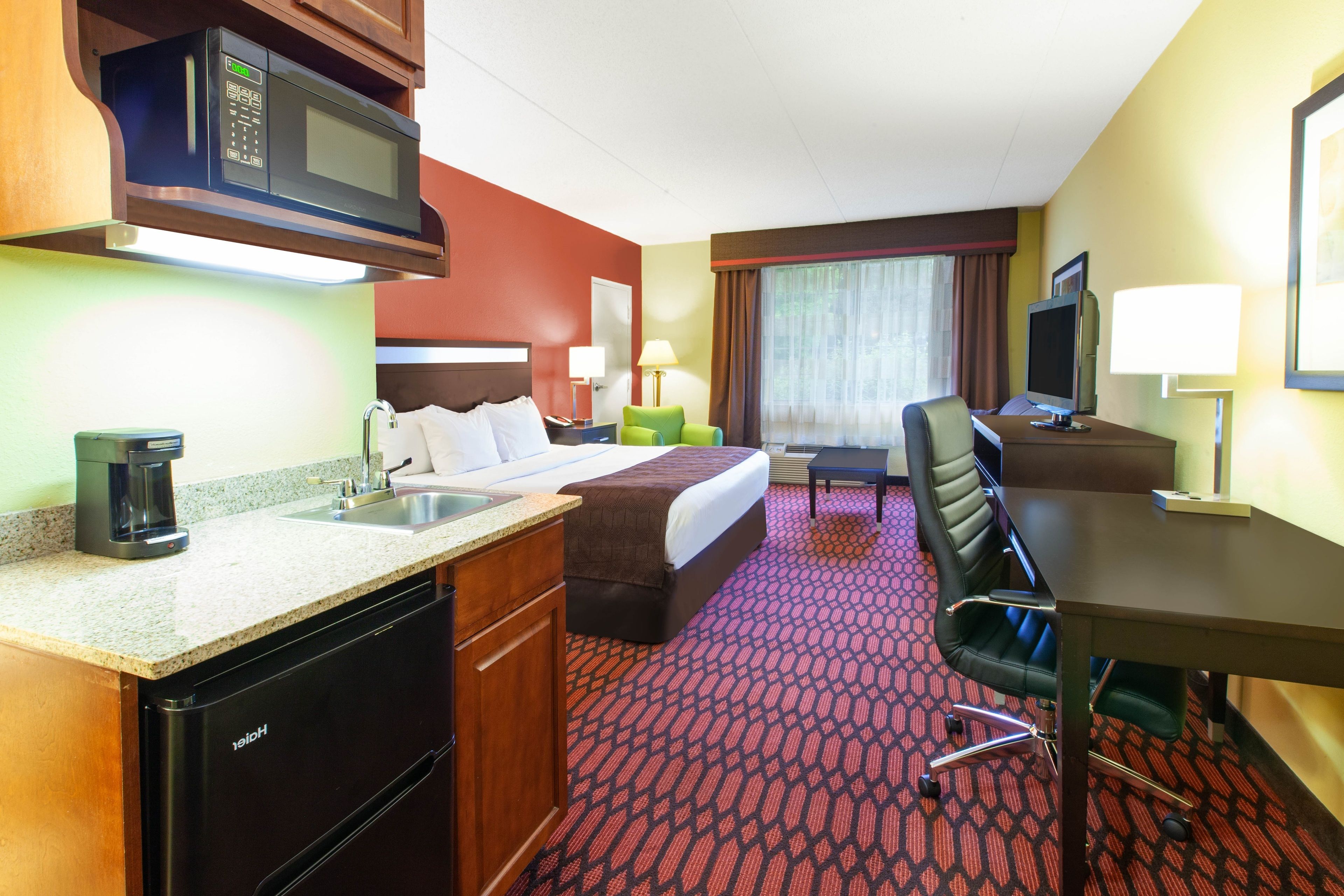 room, 1 king bed, non smoking | desk, blackout curtains, iron/ironing board, free wifi