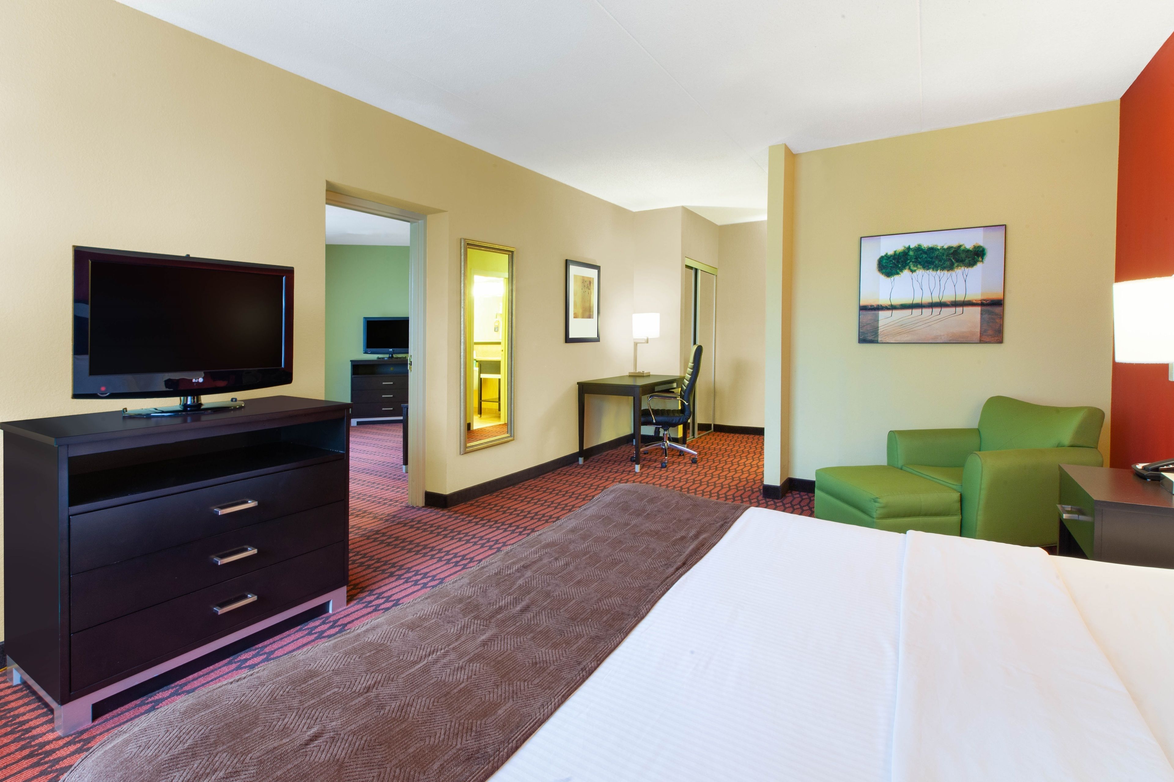 suite, 1 king bed, non smoking | desk, blackout curtains, iron/ironing board, free wifi