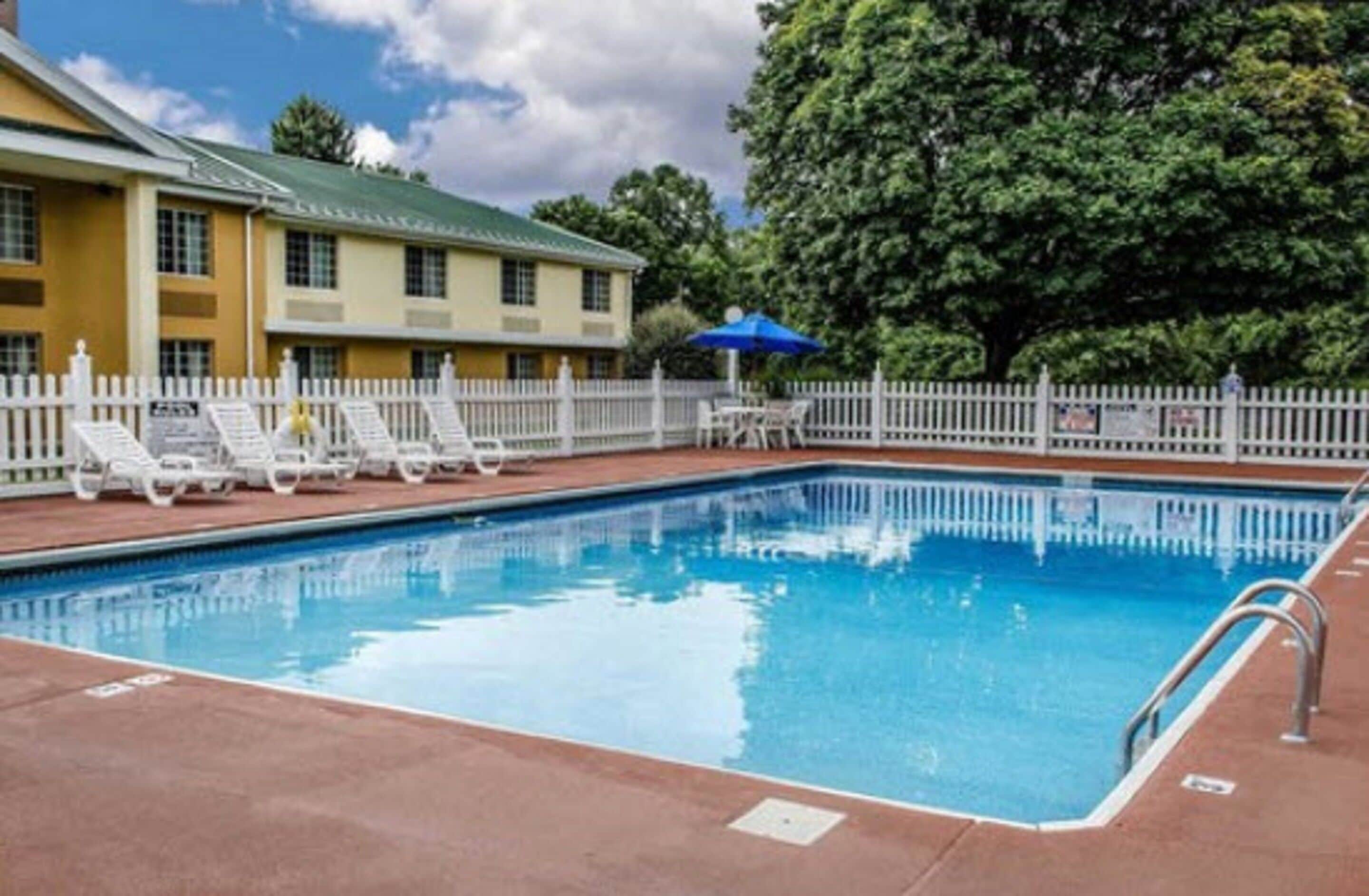 seasonal outdoor pool, open 10:00 am to 8:30 pm, pool umbrellas