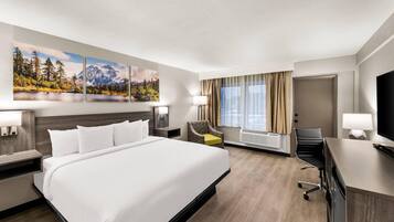 1 King Bed, Balcony | Iron/ironing board, free cots/infant beds, rollaway beds, free WiFi