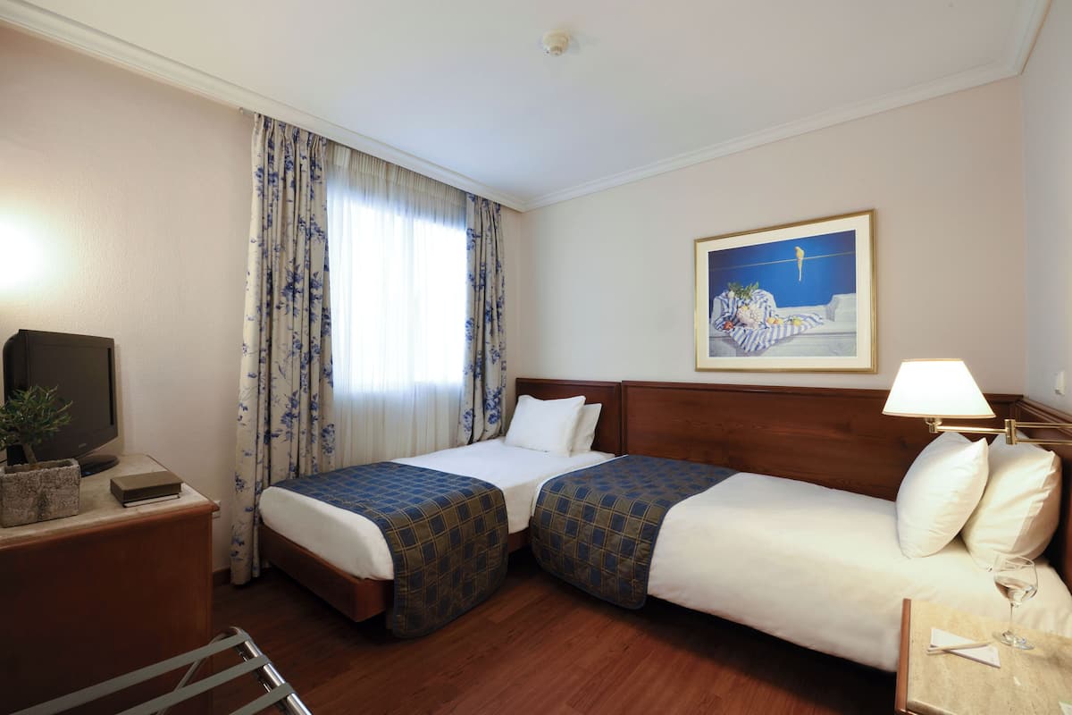 Family Room Standard | 2 bedrooms, minibar, in-room safe, desk