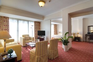 Executive Suite Acropolis View | Living area | 32-inch LCD TV with digital channels, TV, pay movies
