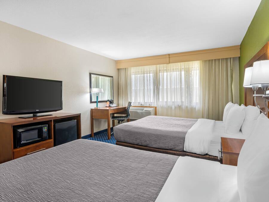 Standard Room, 2 Queen Beds, Non Smoking | 1 bedroom, desk, iron/ironing board, free WiFi