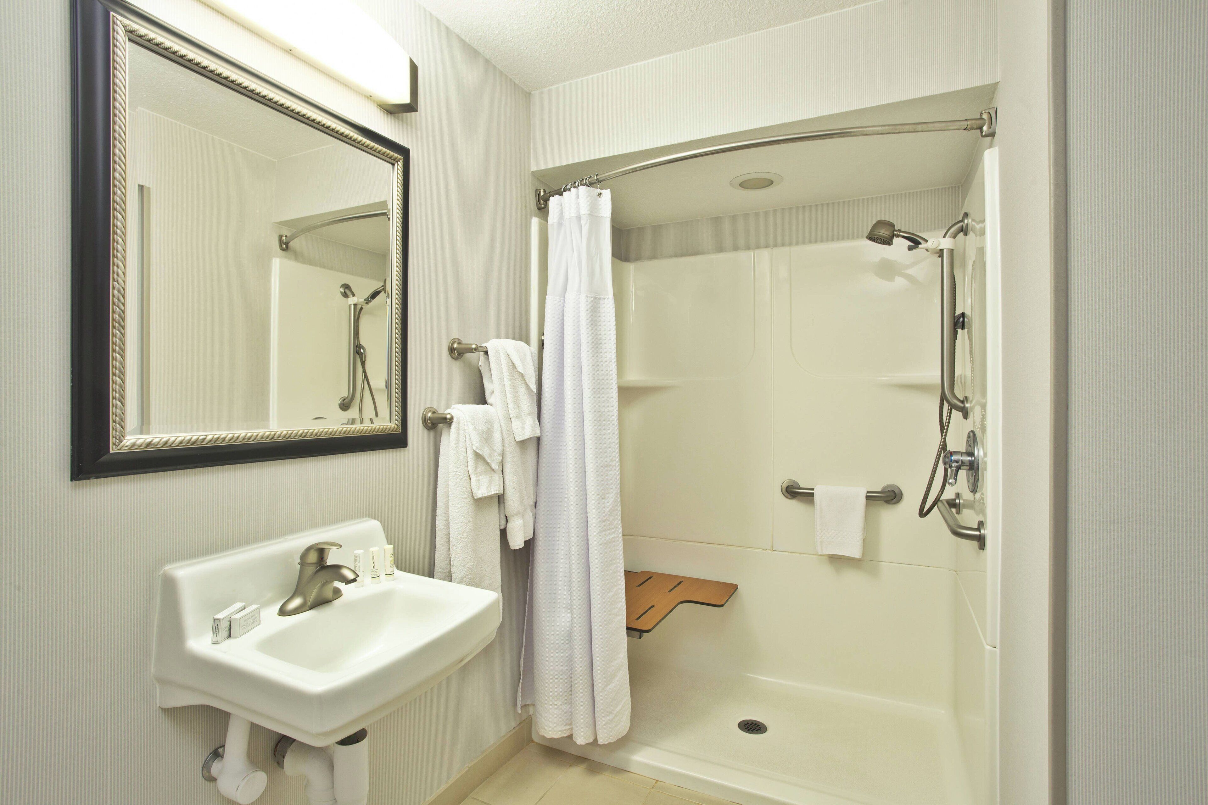 room, 2 queen beds | bathroom | free toiletries, hair dryer, towels, soap