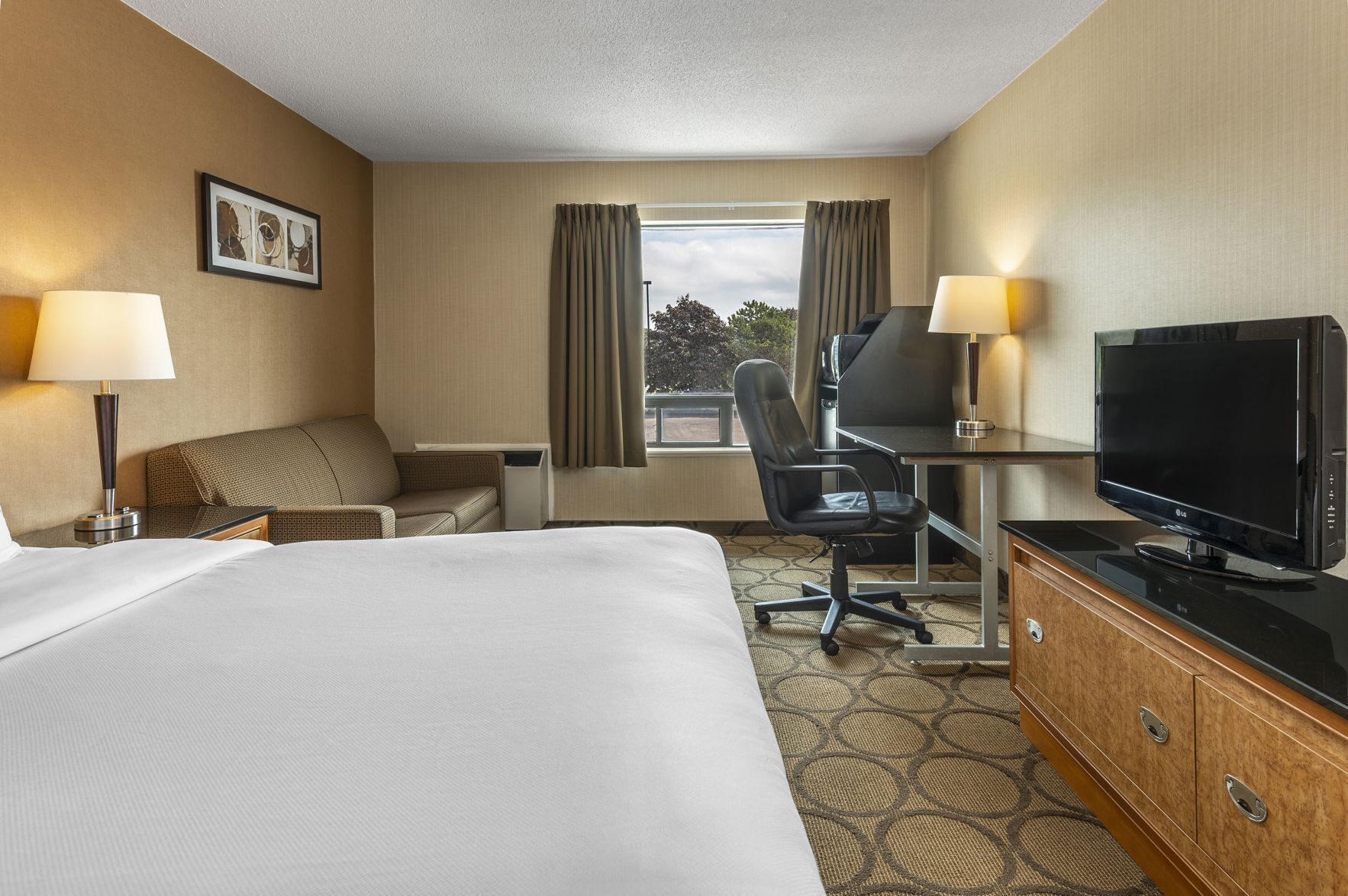 Premium bedding, pillowtop beds, desk, blackout drapes