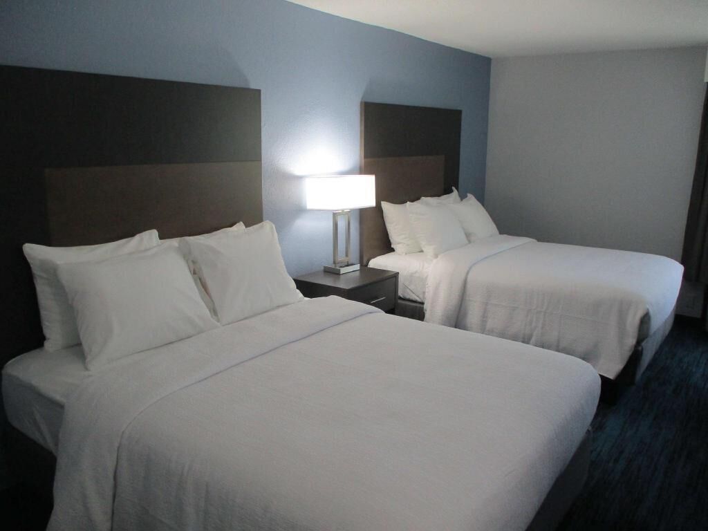 Premium bedding, pillowtop beds, desk, laptop workspace