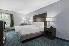 Premium bedding, pillow-top beds, desk, laptop workspace