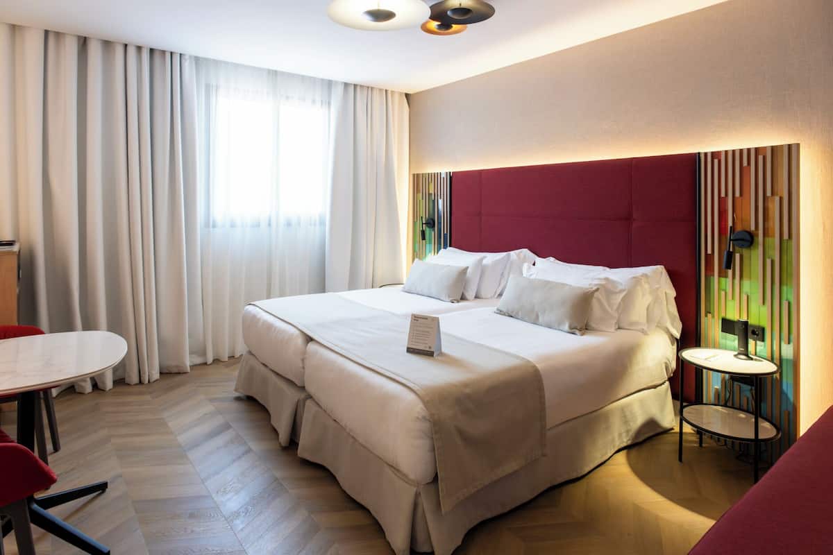 1 habitación, ropa de cama de alta calidad y minibar