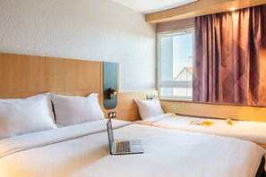 Habitación triple, no fumadores | 1 dormitorio y ropa de cama de alta calidad