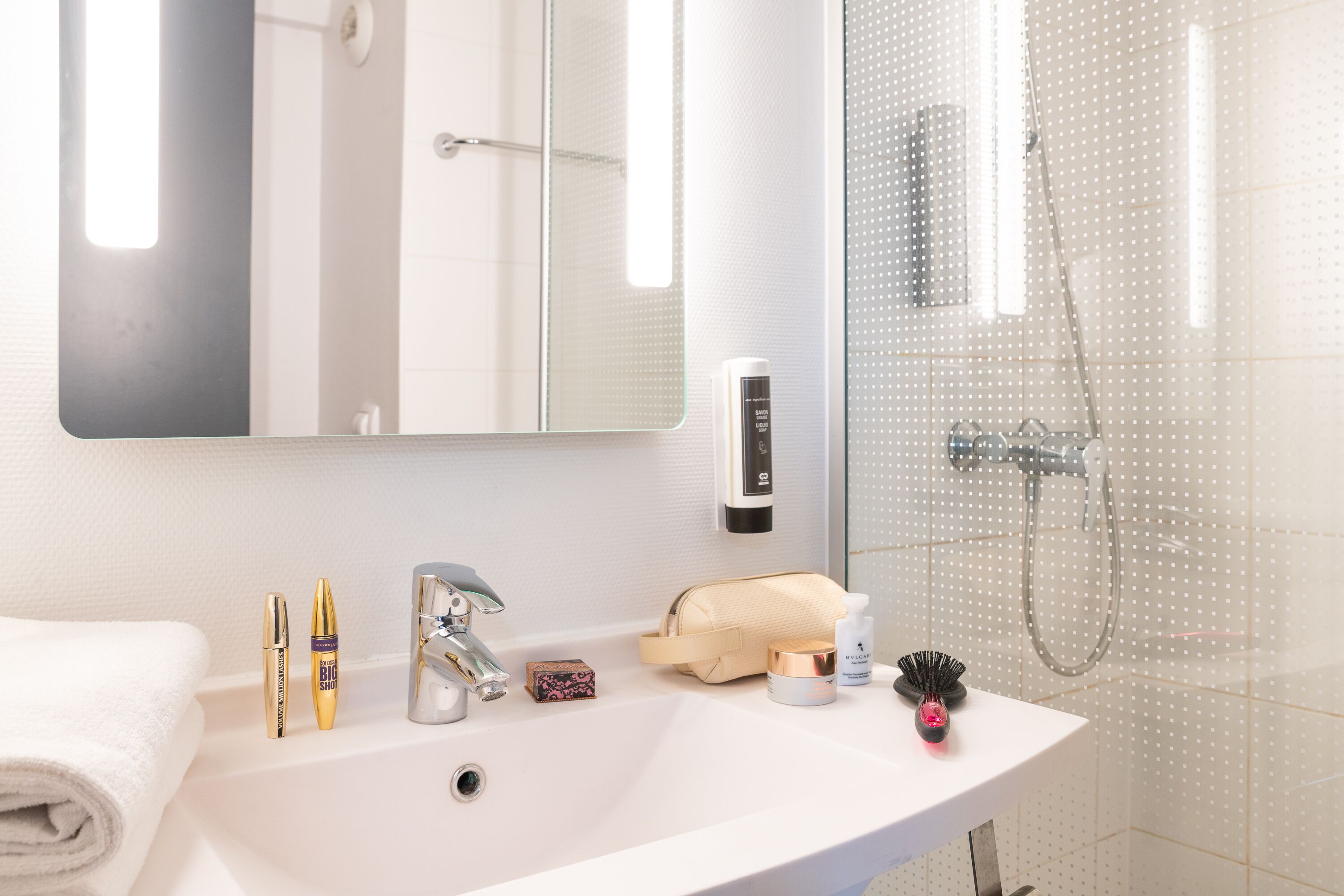 shower, eco-friendly toiletries, hair dryer, towels