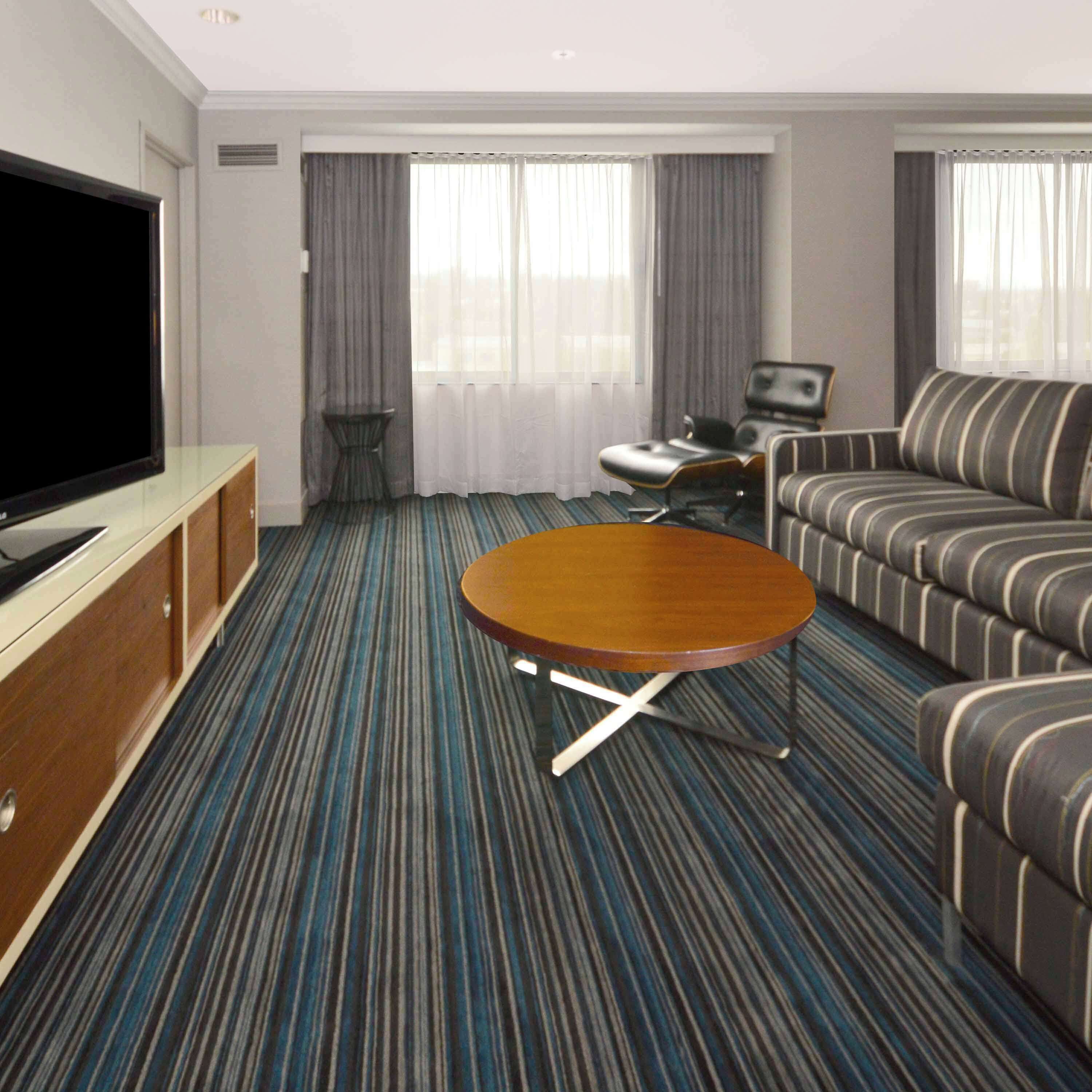 presidential suite, 1 king bed | living area | 55-inch flat-screen tv with cable channels