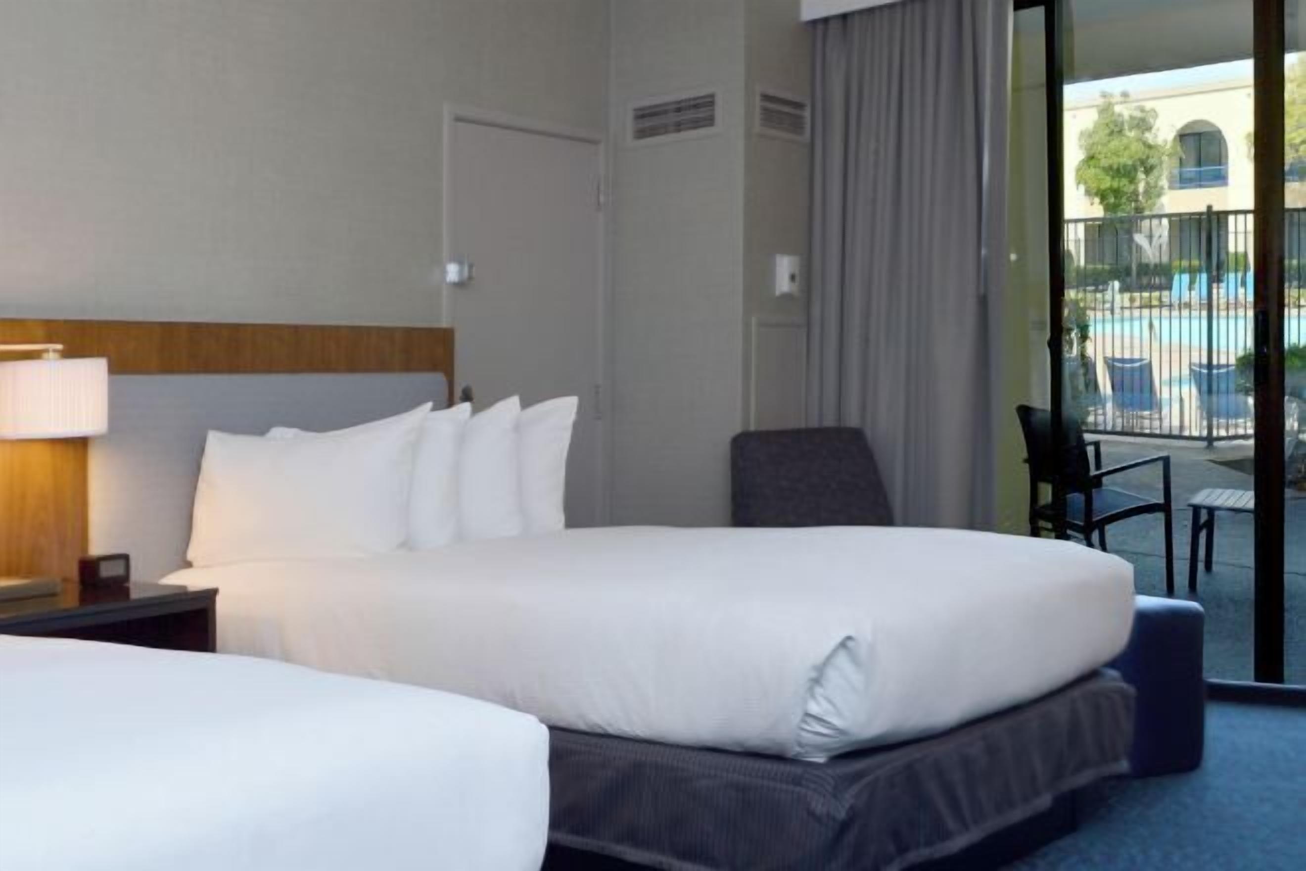 Premium bedding, pillow-top beds, in-room safe, desk