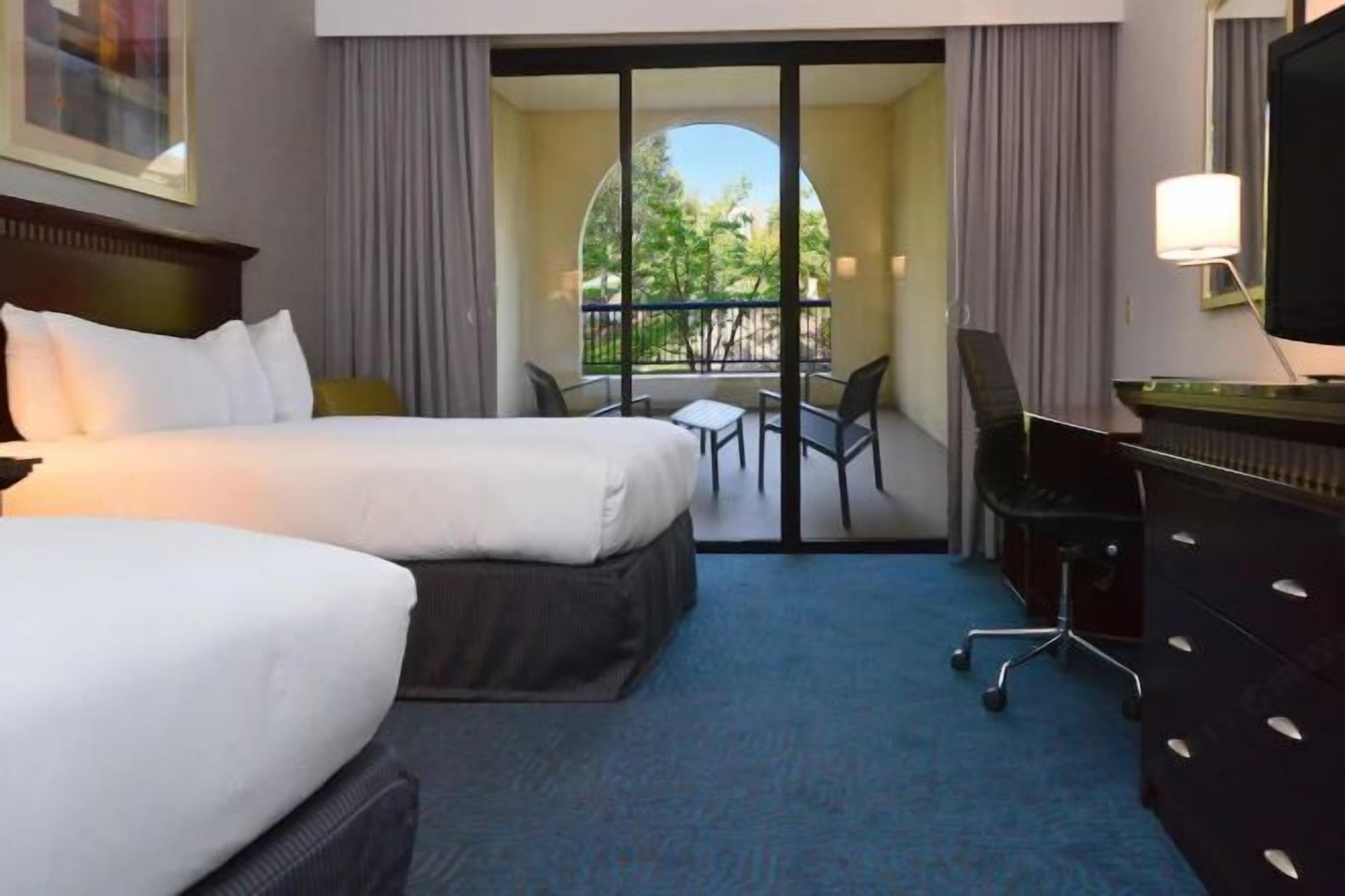 Premium bedding, pillow-top beds, in-room safe, desk