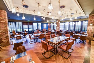 Breakfast, lunch, dinner served; local cuisine