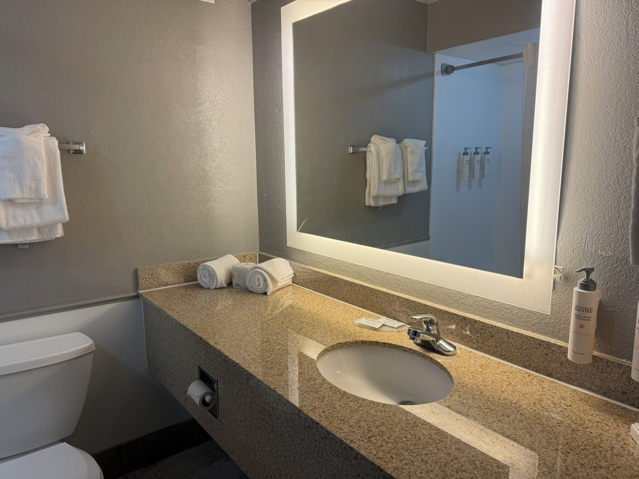 Room, 2 Double Beds | Bathroom | Combined shower/tub, hair dryer, towels, soap