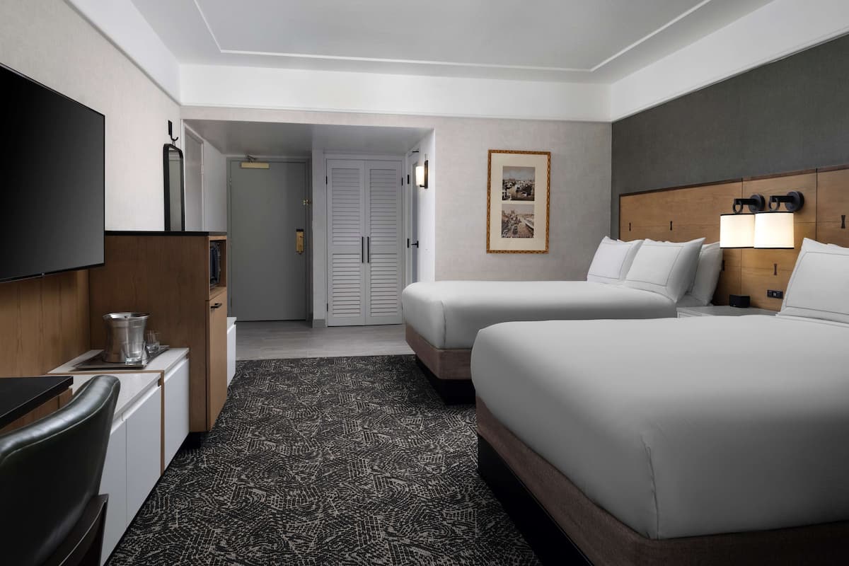 Premium bedding, down comforters, in-room safe, iron/ironing board
