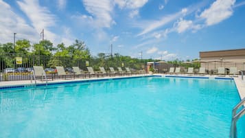 Seasonal outdoor pool, open 11:00 AM to 7:00 PM, pool loungers