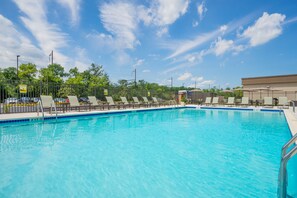 Seasonal outdoor pool, open 11:00 AM to 7:00 PM, sun loungers