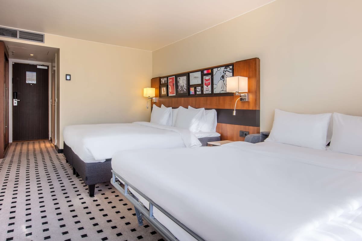 Premium bedding, down comforters, pillowtop beds, in-room safe