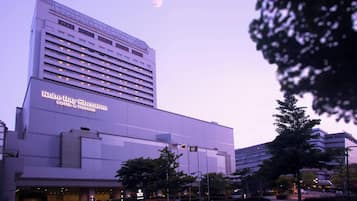Experience the sleek, modern architecture of the Kobe Bay Sheraton Hotel & Towers, set amidst serene urban surroundings.