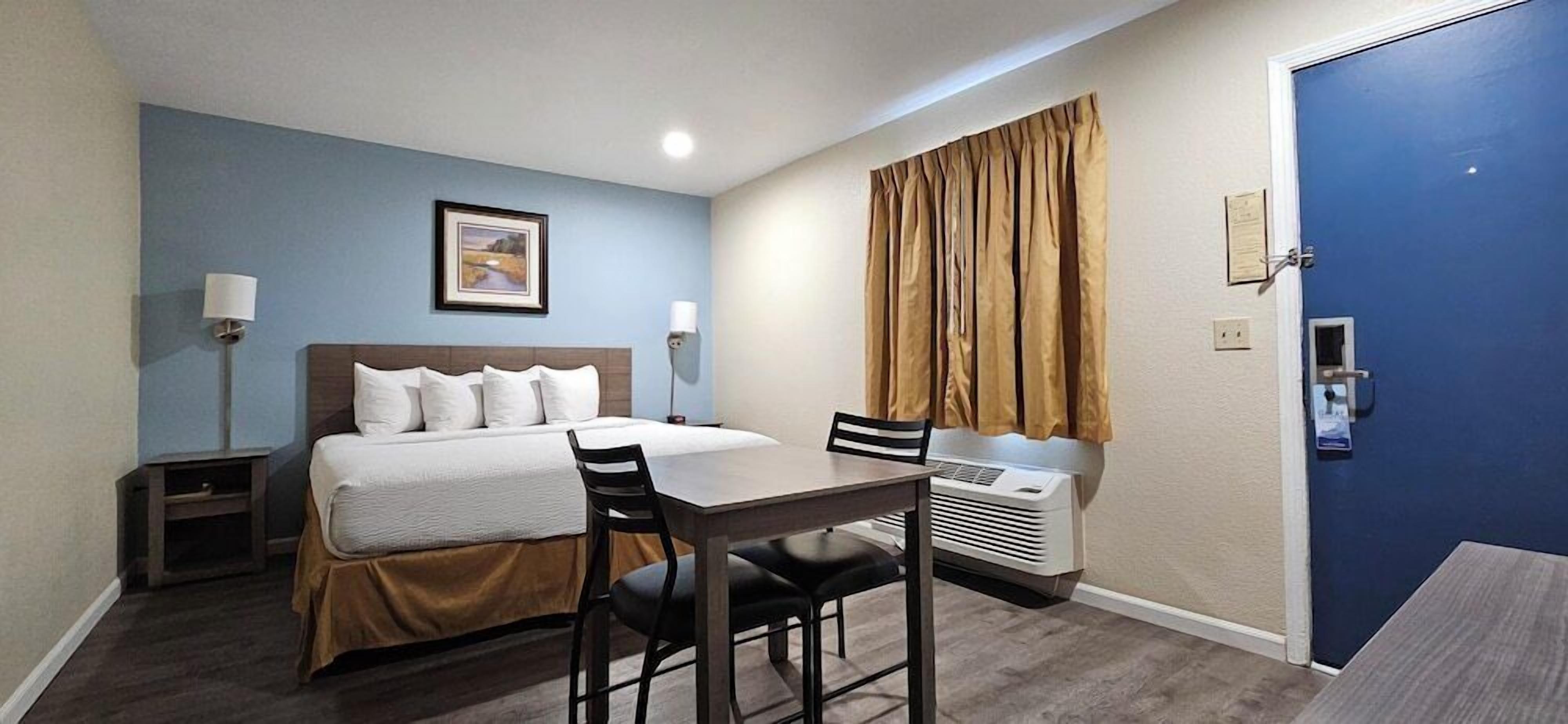 In-room safe, desk, blackout curtains, iron/ironing board