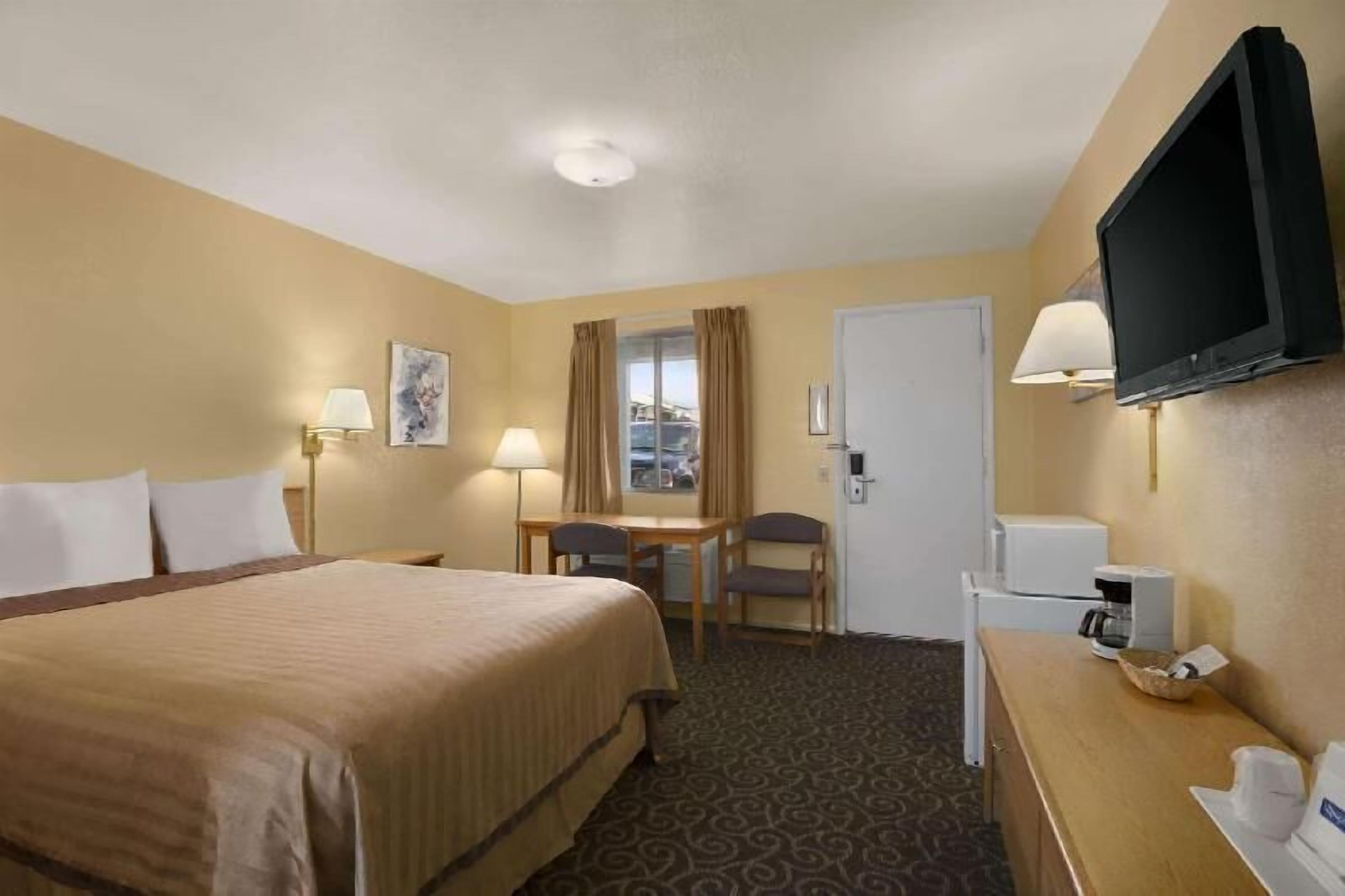 In-room safe, desk, blackout curtains, iron/ironing board