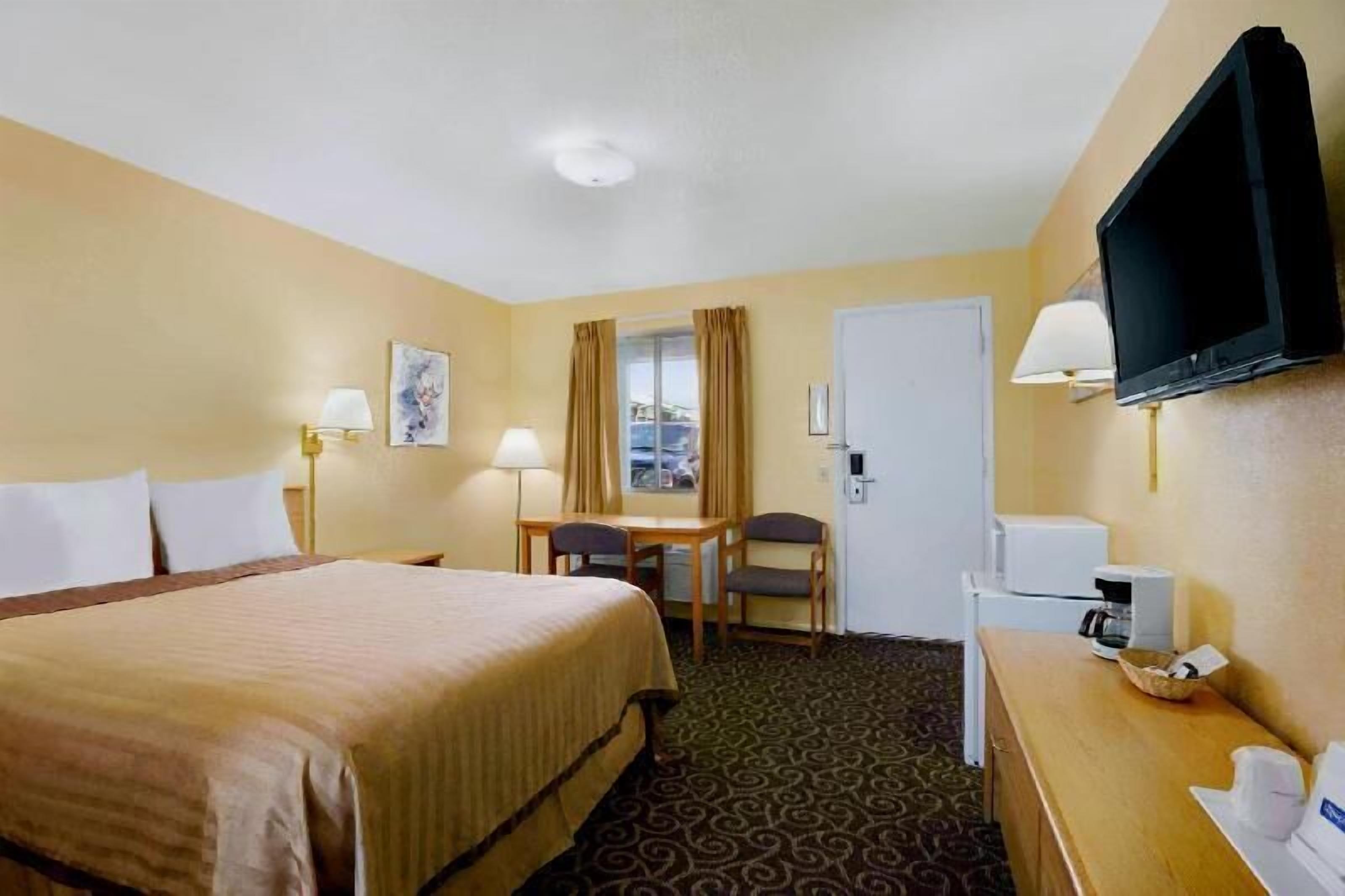 In-room safe, desk, blackout curtains, iron/ironing board