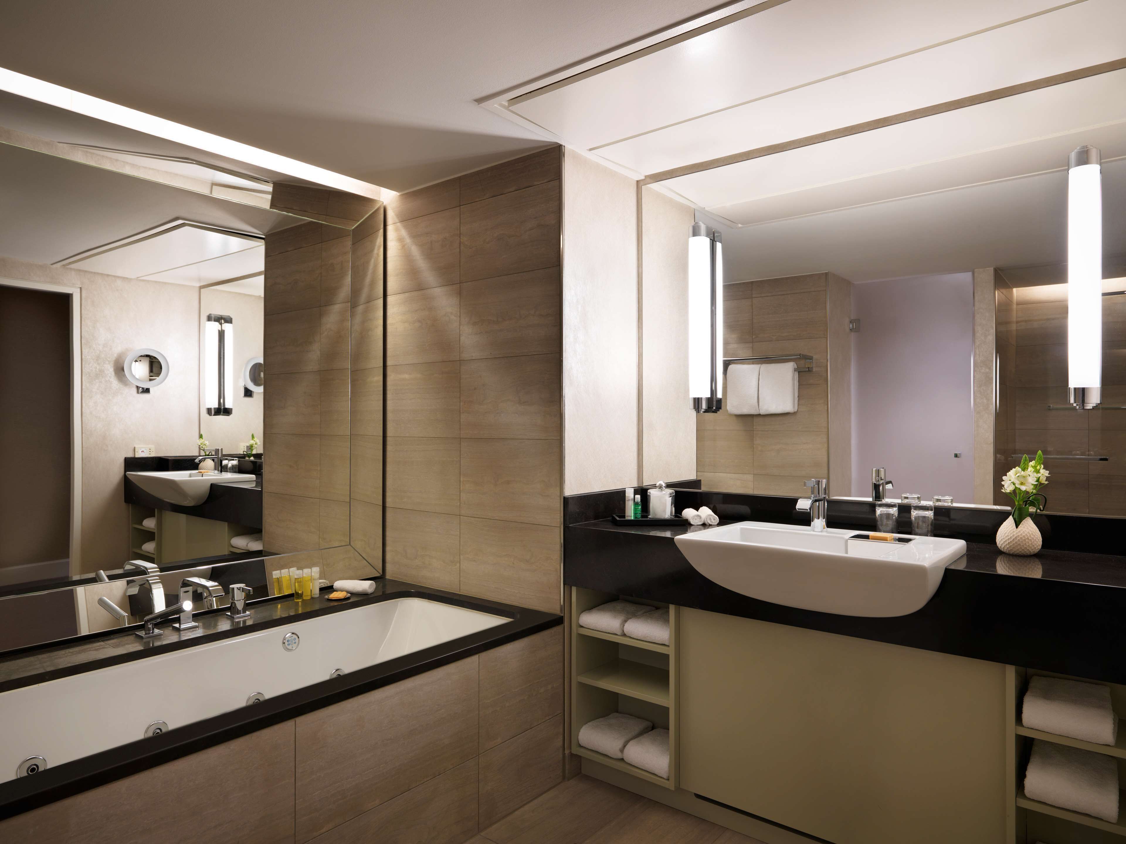 executive suite | bathroom | separate bathtub and shower, hair dryer, bathrobes, slippers
