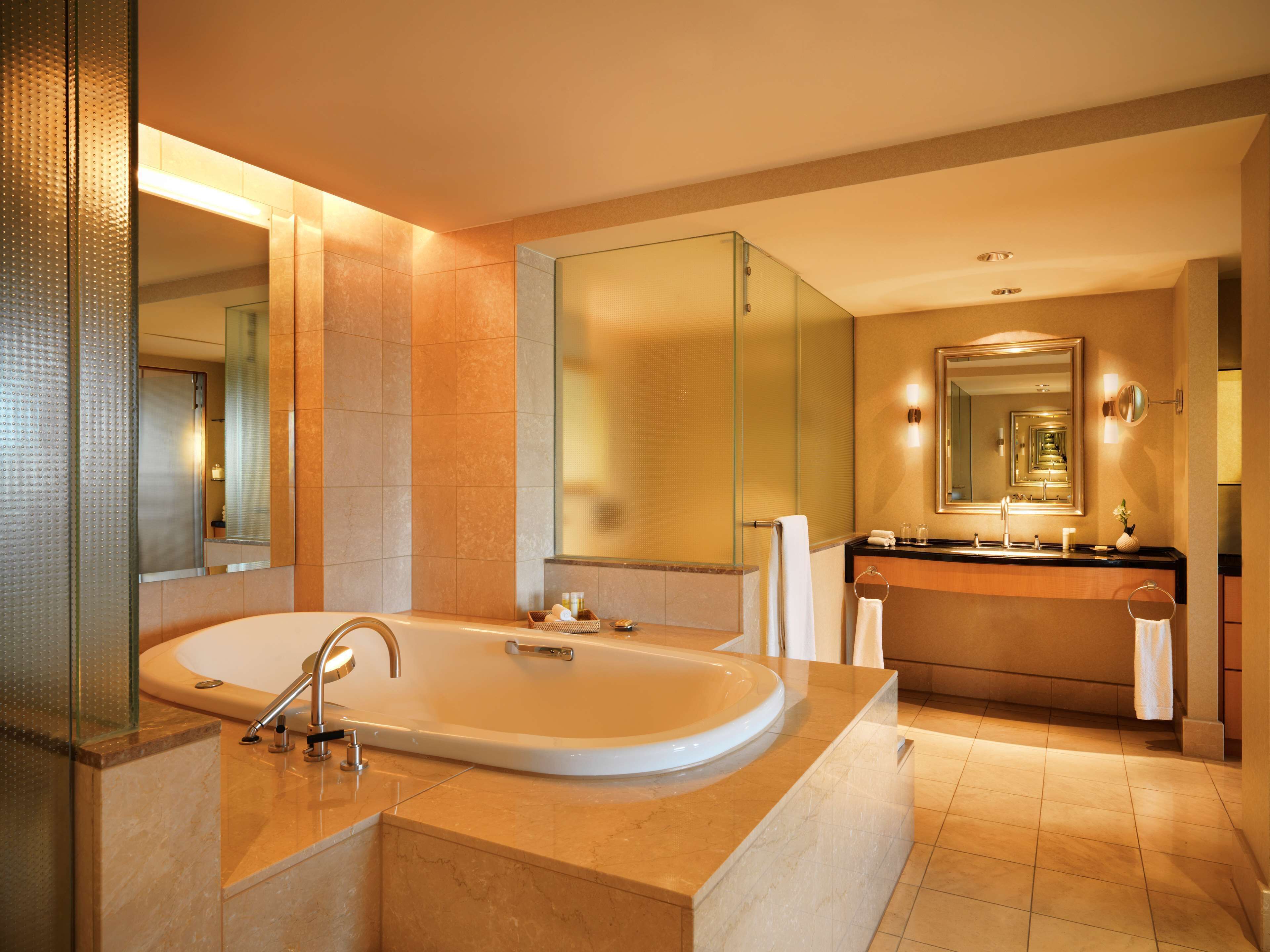 separate bathtub and shower, hair dryer, bathrobes, slippers