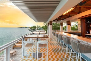3 bars/lounges, poolside bar, beach bar