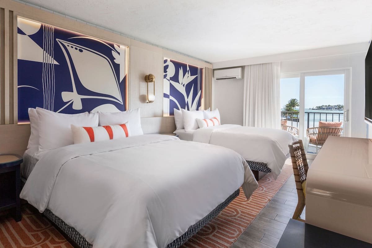 Guest Room, 2 Queens, Marina View, Balcony | In-room safe, individually decorated, individually furnished
