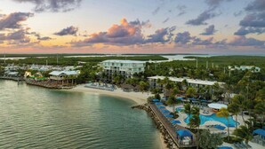 A coastal resort with a beach, a swimming pool, and multiple buildings. - Three Waters Resort and Marina, Islamorada, a Tribute Portfolio Resort (Islamorada)