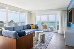 Suite, 2 Double Beds, Balcony, Oceanfront | Living area | 37-inch flat-screen TV with cable channels, TV