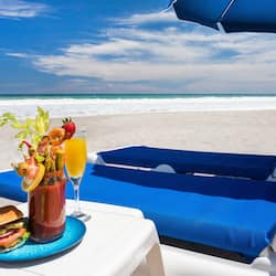 On the beach, sun loungers, beach umbrellas, beach towels