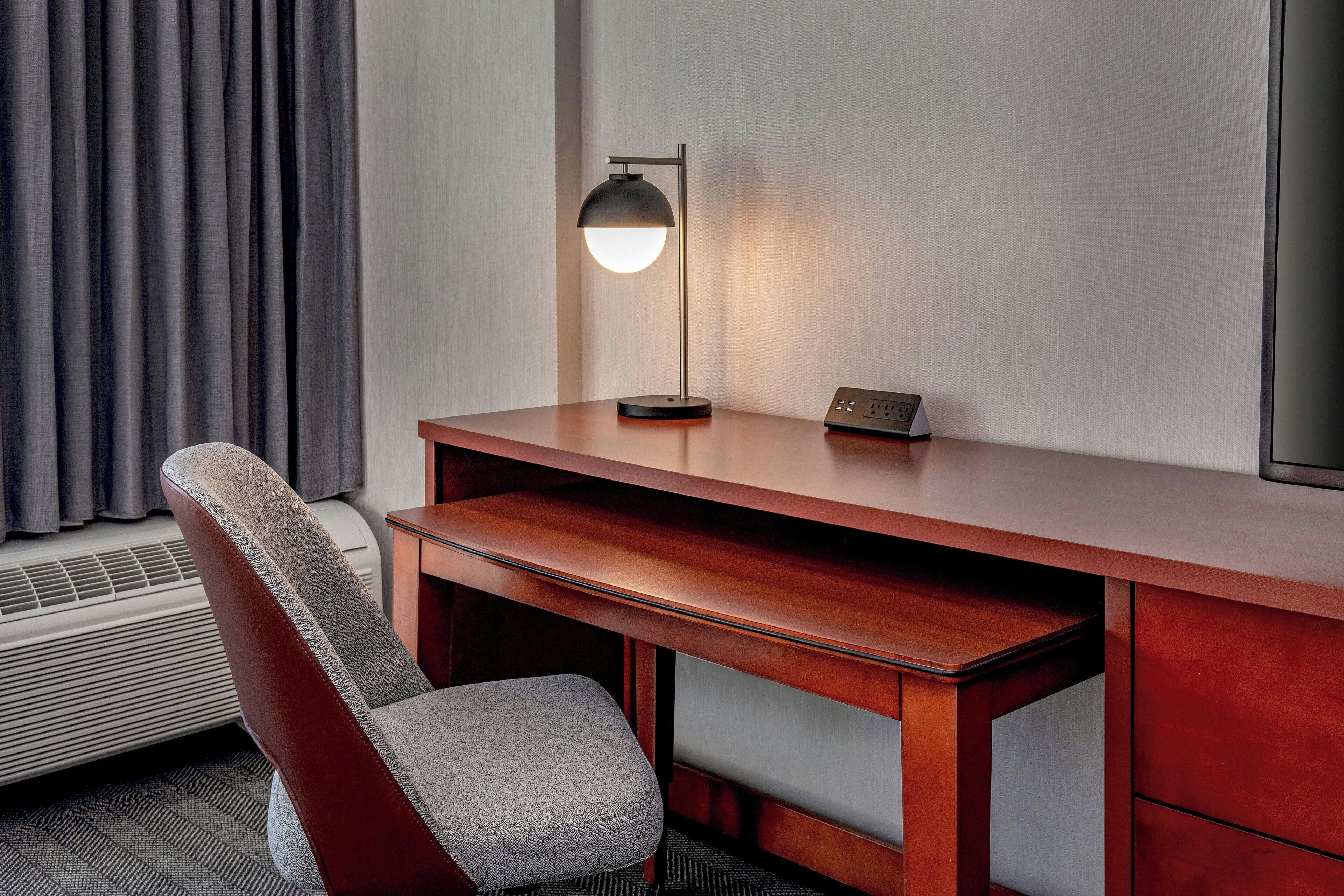 premium bedding, desk, laptop workspace, blackout curtains