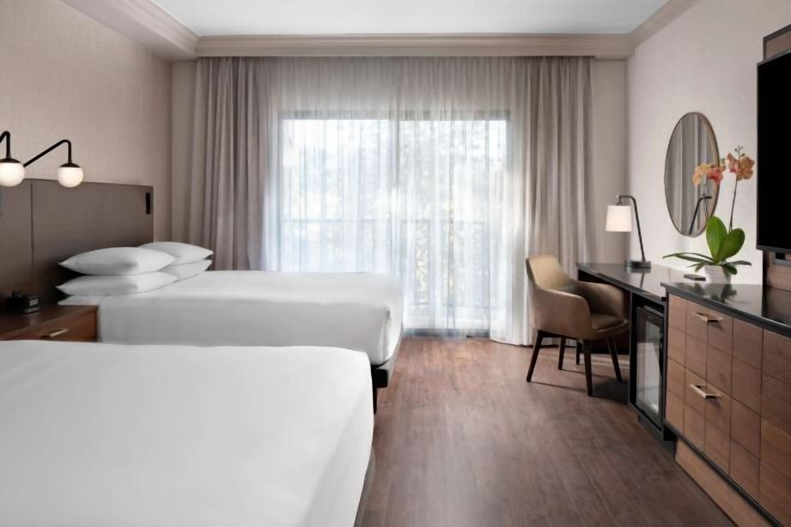 Premium bedding, down duvets, in-room safe, desk