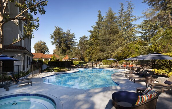 Outdoor pool, pool umbrellas, sun loungers