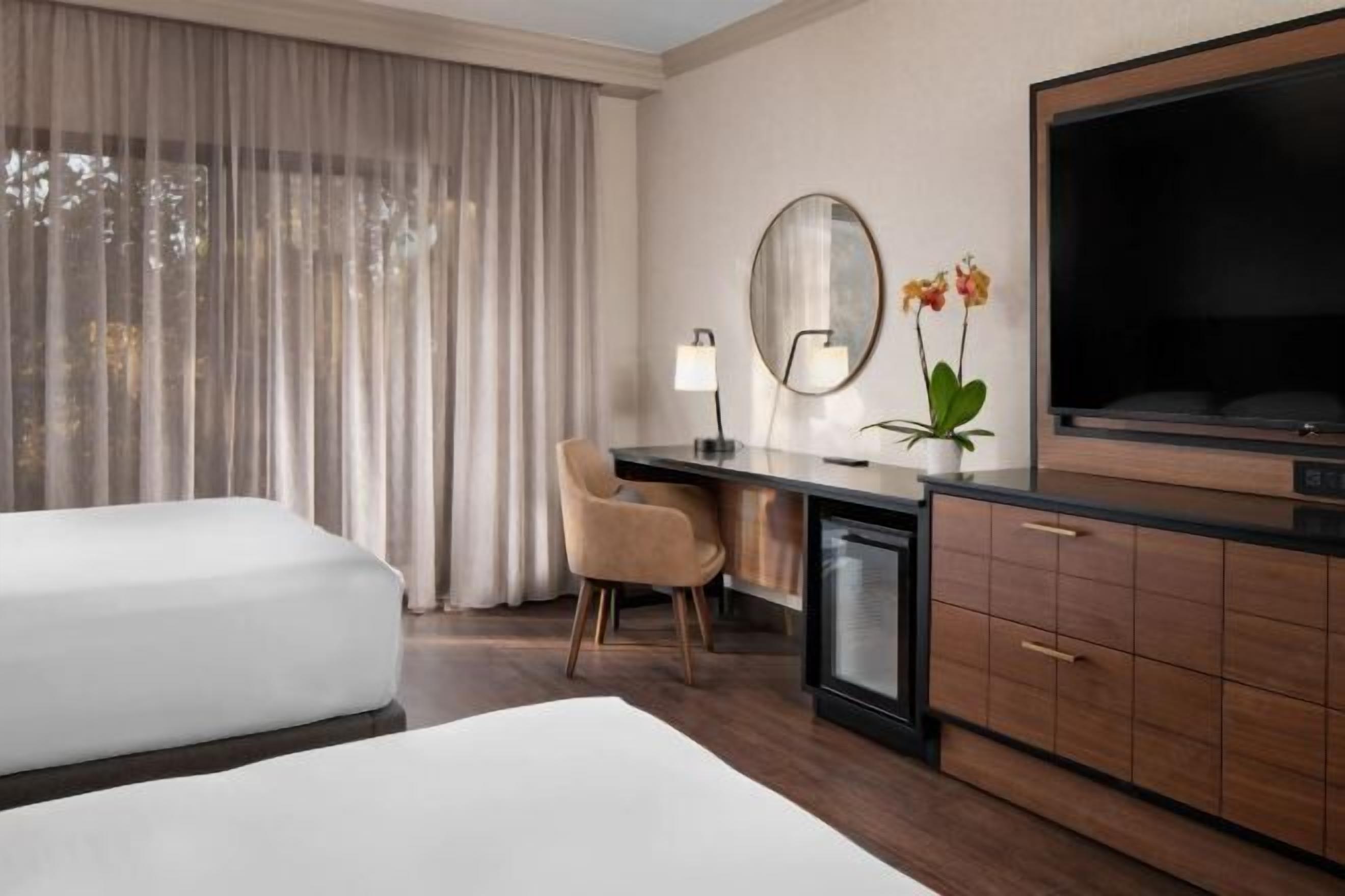 Premium bedding, down duvets, in-room safe, desk