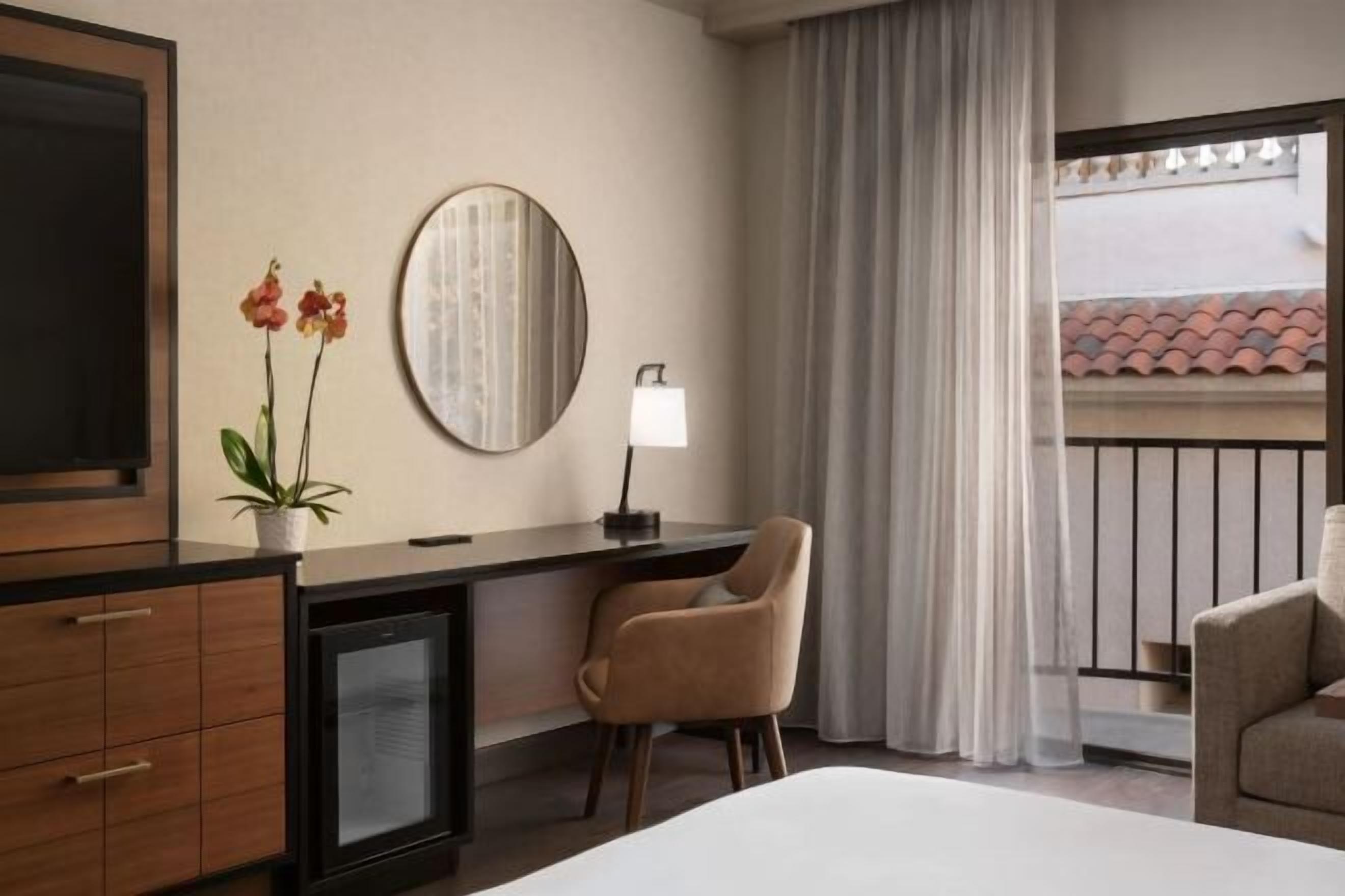 Premium bedding, down duvets, in-room safe, desk