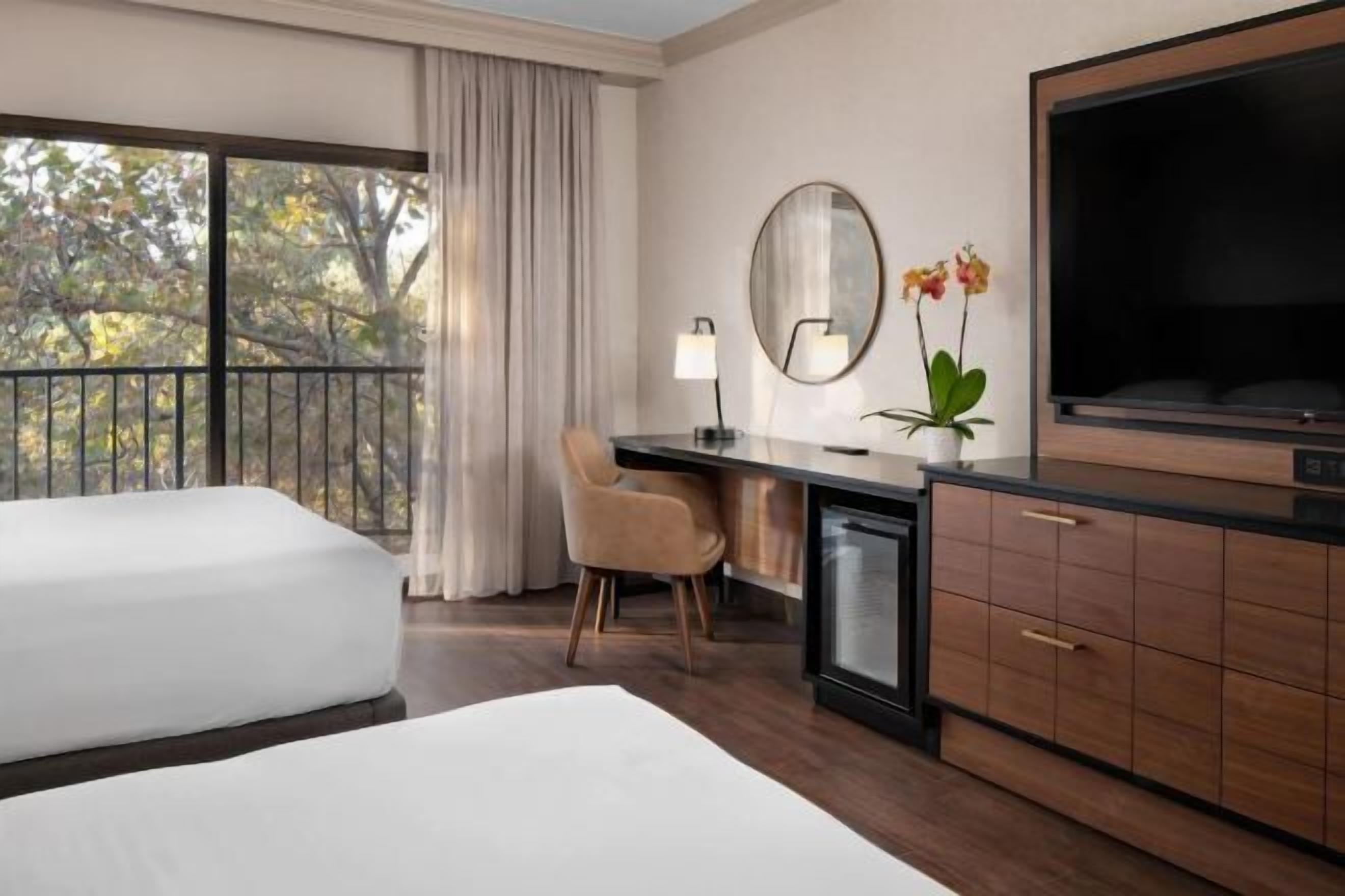 Premium bedding, down duvets, in-room safe, desk