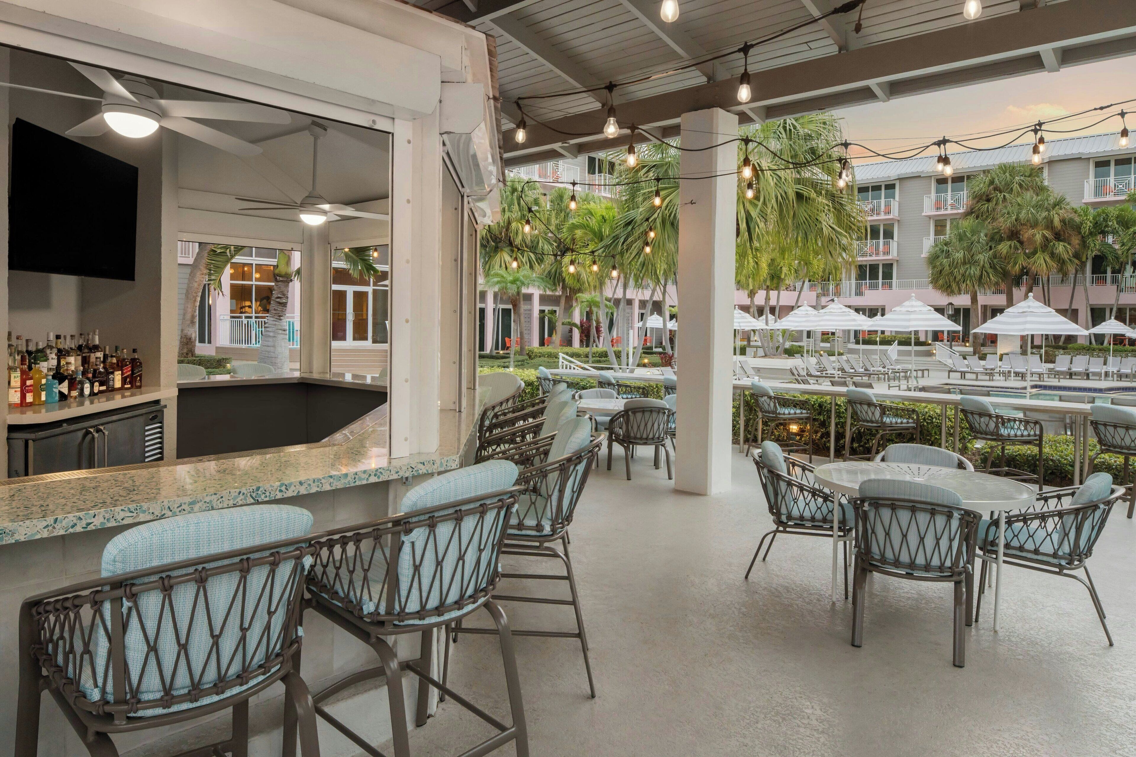 3 outdoor pools, open 7:00 AM to 10:00 PM, pool umbrellas, pool loungers