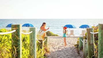 On the beach, white sand, free beach shuttle, beach towels