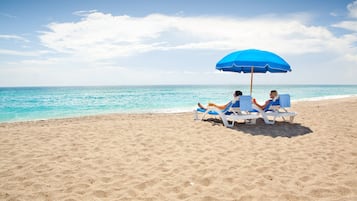 On the beach, white sand, free beach shuttle, beach towels