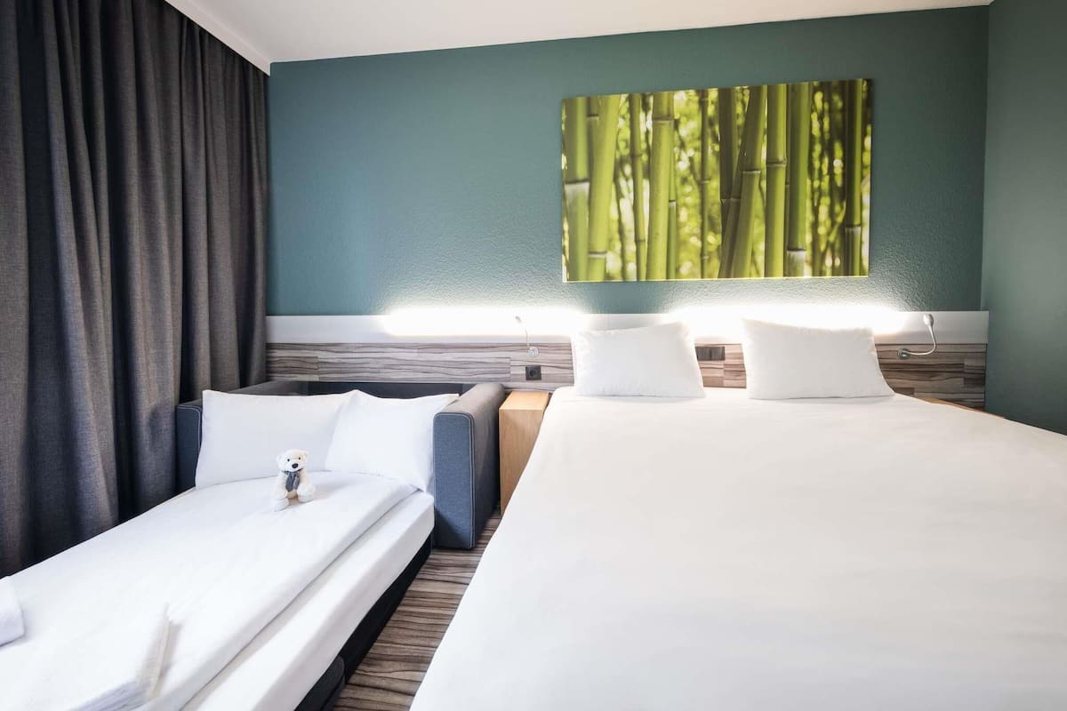 Family Room, 1 King Bed with Sofa bed | 1 bedroom, premium bedding, desk, blackout drapes