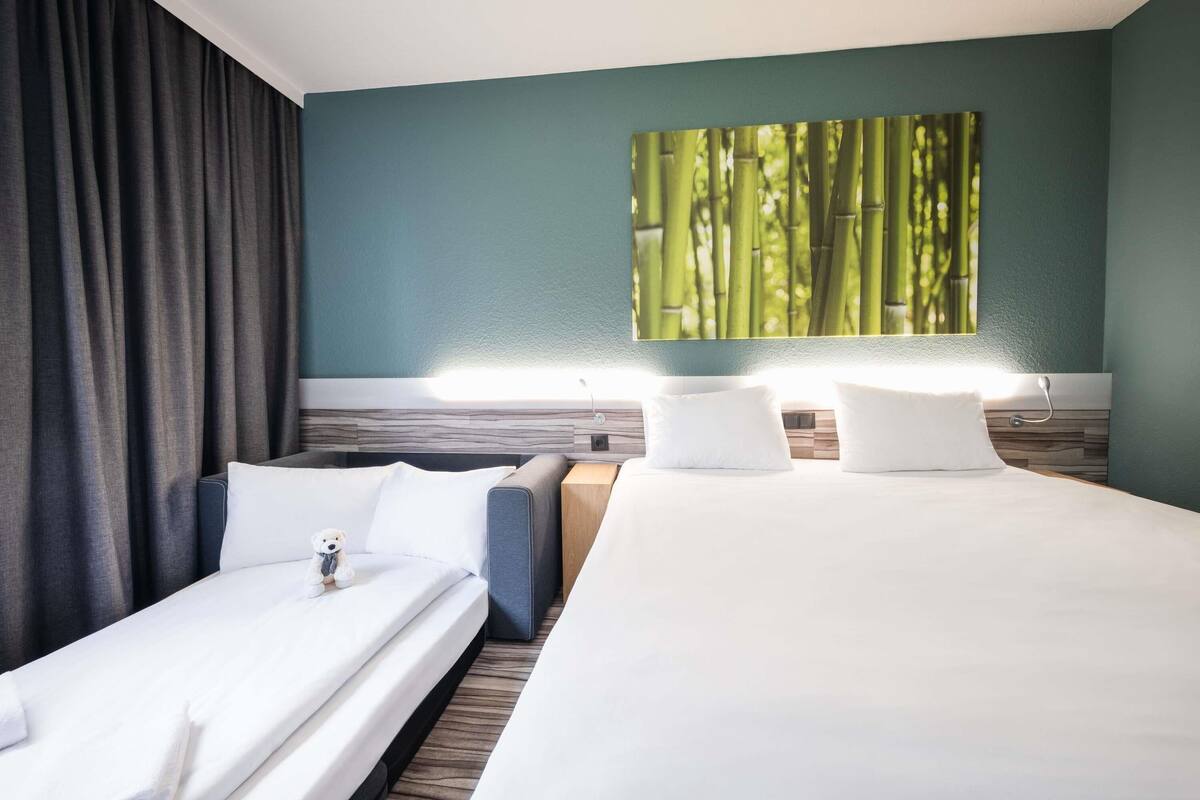 Family Room, 1 King Bed with Sofa bed | 1 bedroom, premium bedding, desk, blackout drapes