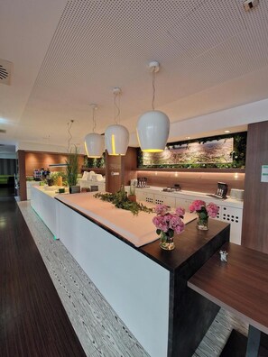Breakfast, lunch, dinner served; international cuisine, pool views 
