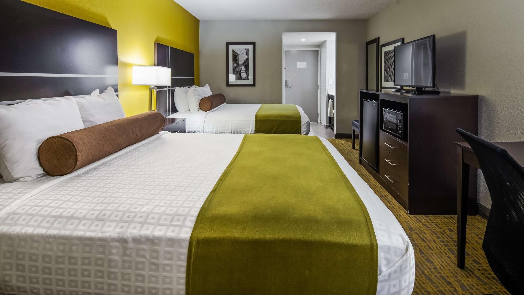 Premium bedding, desk, laptop workspace, soundproofing